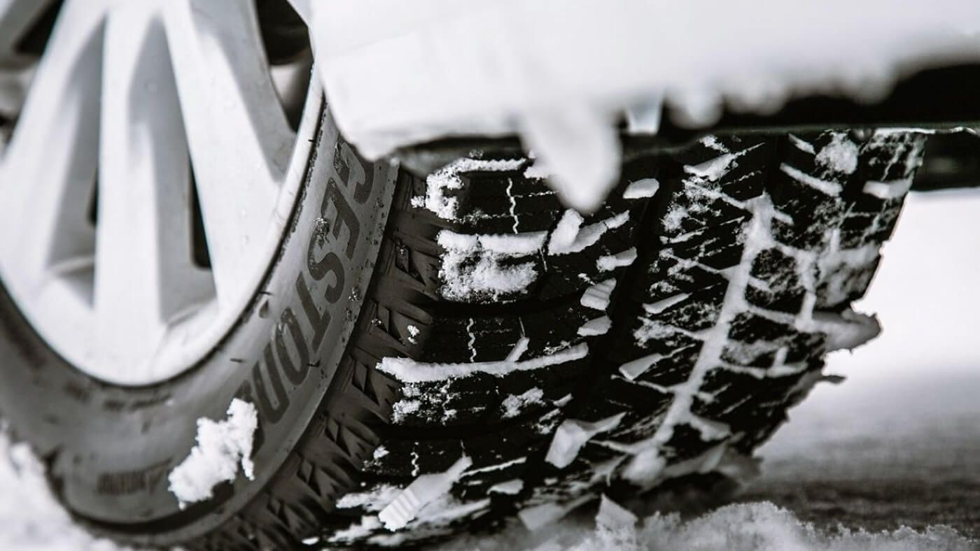 Close-up of Bridgestone Blizzak WS-90 on snow-covered roads